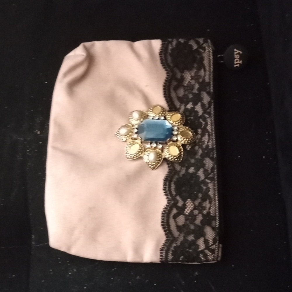 Elegant Beige and Black Clutch with Jewel Accent